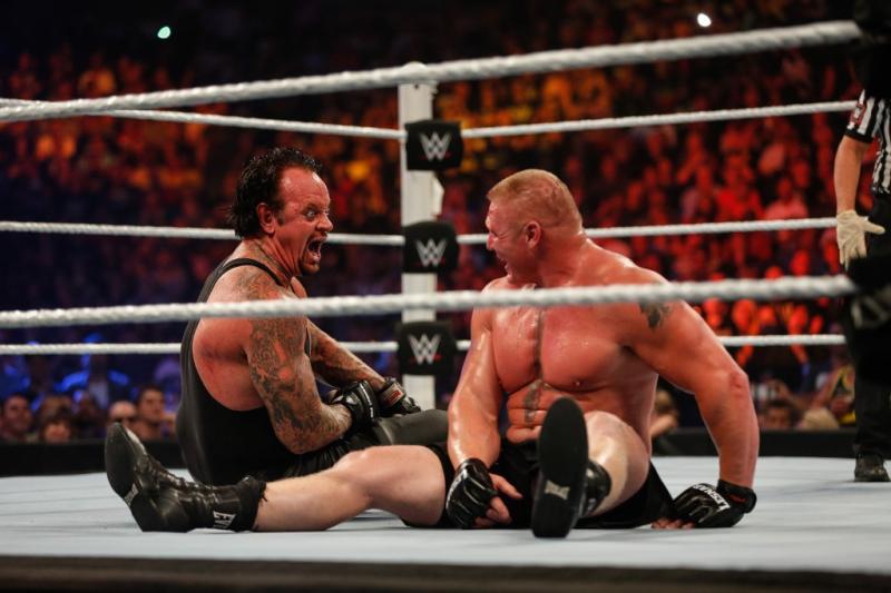The Undertaker y Brock Lesnar - AFP