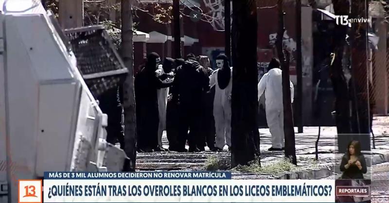 Reportajes T13: ¿Quiénes están detrás de los "overoles blancos" en los liceos?
