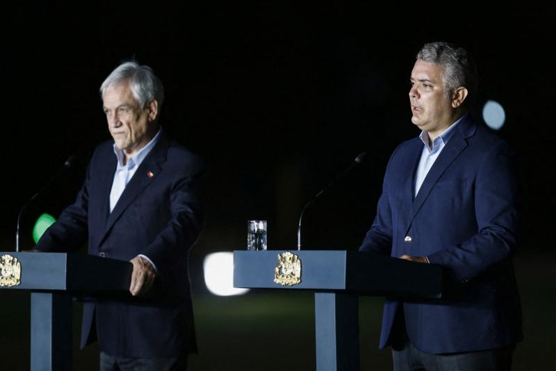 Duque por Tren de Aragua en Chile - (AFP) Iván Duque y Sebastián Piñera