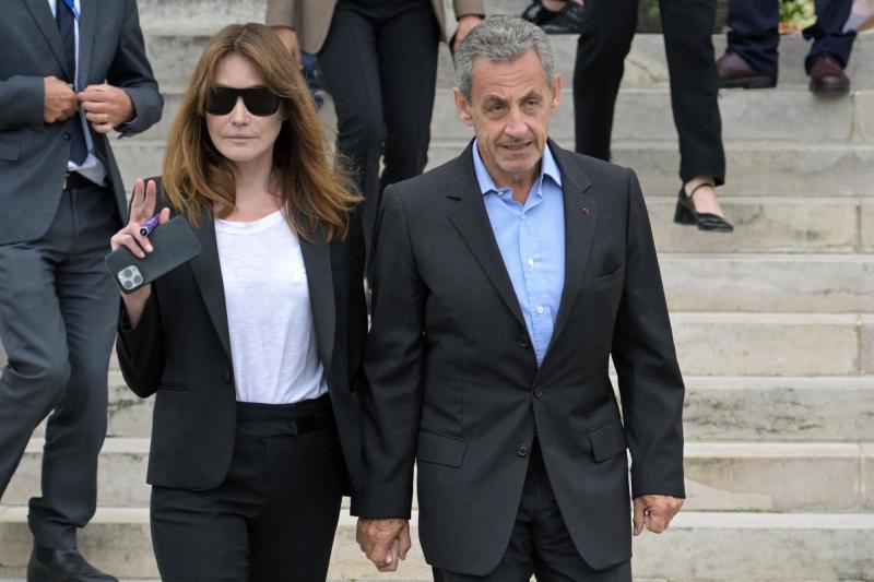 Carla Bruni y Nicolas Sarkozy - AFP
