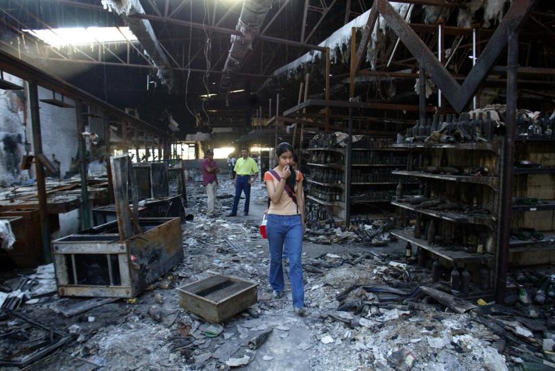 AFP - supermercado Ycuá Bolaños