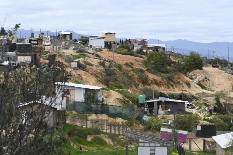 T13 - Dueño fue asesinado por sicario colombiano: La historia detrás de la toma que será demolida este lunes en Quilpué | Agencia UNO
