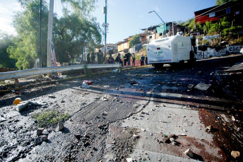 Agencia Uno - Desalojo de la toma en el Cerro 18 de la comuna de Lo Barnechea