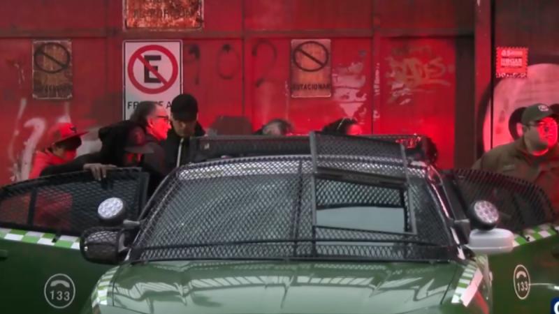 Investigan homicidio en taller mecánico de Cerro Navia - T13