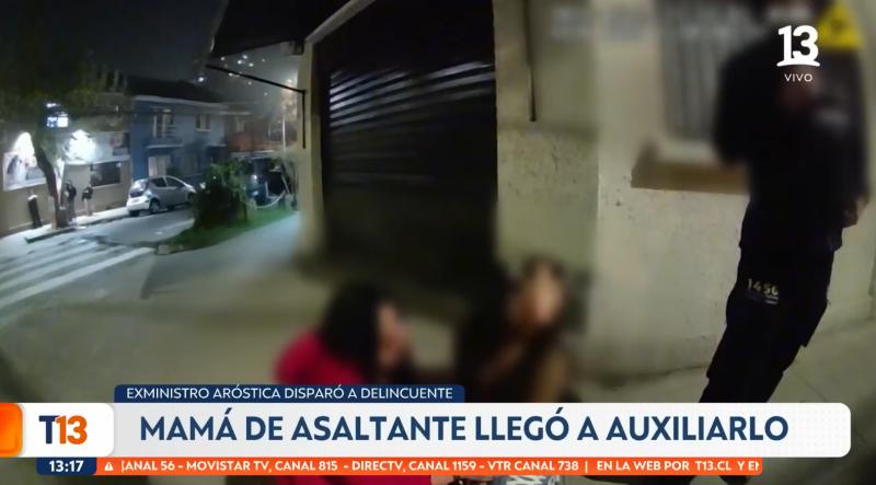 T13 - Madre intentando rescatar a su hijo herido por Iván Aróstica