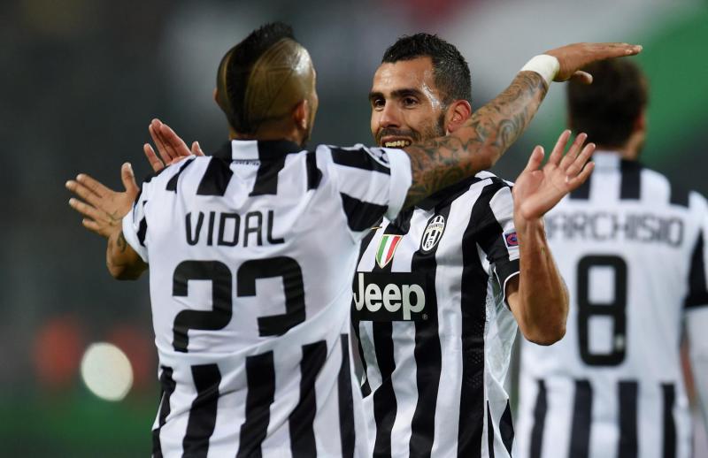 Vidal y Tevez en Juventus - AFP (2015)