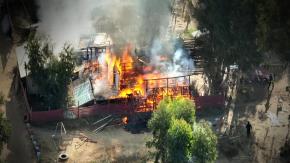 Desalojo de megatoma en San Antonio deja a dos carabineros baleados