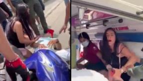 [VIDEO] Mujer no deja que atiendan a su pareja herida hasta que le entregue la clave del teléfono