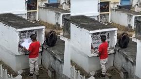 Ecuador: Captan a niño visitando la tumba de un familiar para mostrarle sus buenas notas Ecuador: Captan a niño visitando la tumba de un familiar para mostrarle sus buenas notas