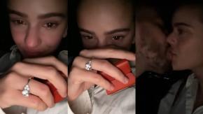 Entre lágrimas y luciendo un gran anillo: Rosalía y Rauw Alejandro anuncian su matrimonio en el videoclip de "Beso" Entre lágrimas y luciendo un gran anillo: Rosalía y Rauw Alejandro anuncian su matrimonio en el videoclip de "Beso"