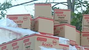 Detienen a 5 personas por robo de camión: Fueron sorprendidos cuando descargaban cajas de aceite