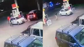Cámara captó instante en que funcionario de la PDI repelió asalto a balazos en San Bernardo Cámara captó instante en que funcionario de la PDI repelió asalto a balazos en San Bernardo