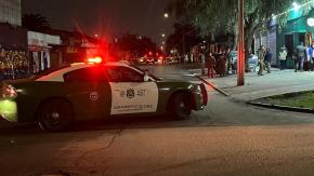 Carabinero de civil frustra a balazos intento de "portonazo" en Macul: un delincuente falleció en el lugar Carabinero de civil frustra a balazos intento de "portonazo" en Macul: un delincuente falleció en el lugar