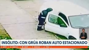 Insólito: Delincuentes roban vehículos estacionados con una grúa en Lo Prado Insólito: Delincuentes roban vehículos estacionados con una grúa en Lo Prado
