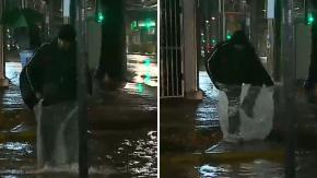 Intensa lluvia en la capital: Captan ingeniosa técnica de vecino de El Bosque para cruzar calles inundadas Intensa lluvia en la capital: Captan ingeniosa técnica de vecino de El Bosque para cruzar calles inundadas