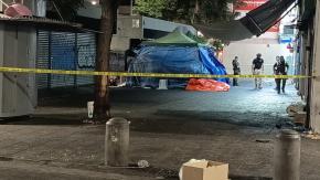 Homicidio en pleno Santiago Centro: hombre es hallado muerto con un disparo en la cabeza
