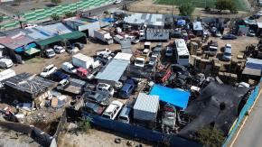 Intenso operativo en terreno del Serviu tomado de Cerrillos: encuentran más de 100 autos, varios robados y 10 detenidos