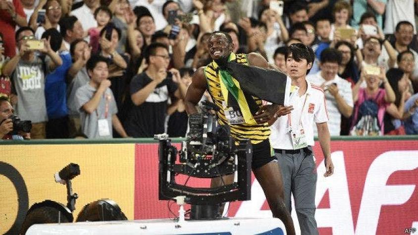 Usain Bolt bromea tras accidente en Beijing: "Intentó matarme"