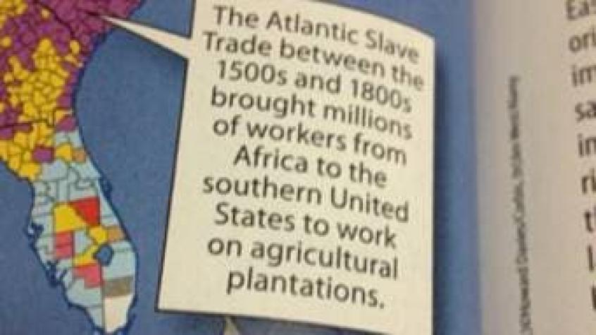El texto escolar estadounidense que trata a los esclavos de inmigrantes trabajadores
