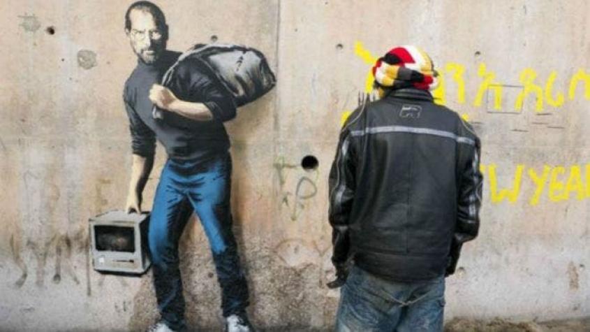 Steve Jobs como migrante: el nuevo grafiti de Bansky en "La jungla" de Calais