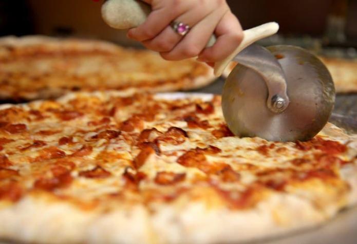 Estudio revela la forma más equitativa para cortar la pizza
