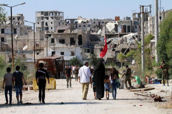 Siria asegura que salieron docenas de familias de Alepo