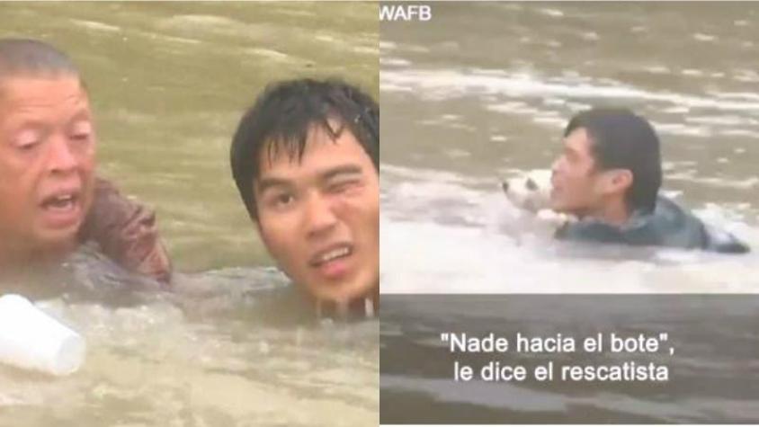 El dramático rescate de una mujer y un perro encerrados en un auto inundado