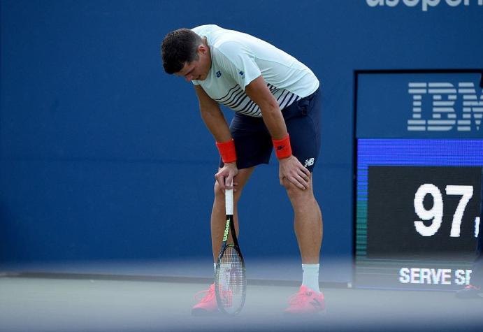 Milos Raonic cae en US Open con visibles muestras de dolor