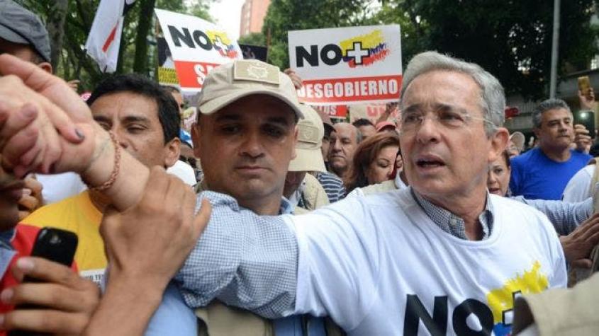 Uribe insiste en "reclusión" de 5 a 8 años para FARC por "delitos atroces" en Colombia