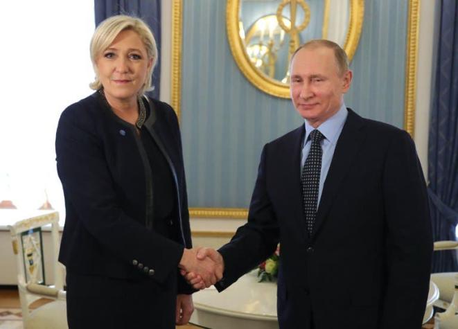 Putin y Le Pen se reunen en Moscú