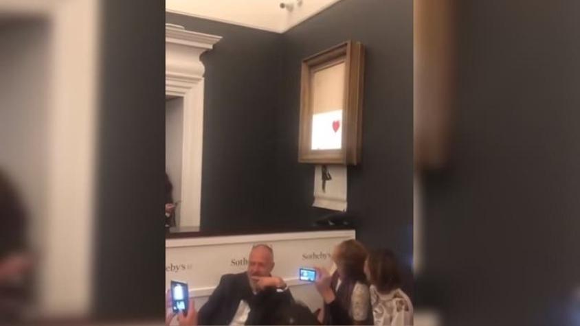 [VIDEO] Obra de Bansky se autodestruye tras ser subastada por un millón de libras