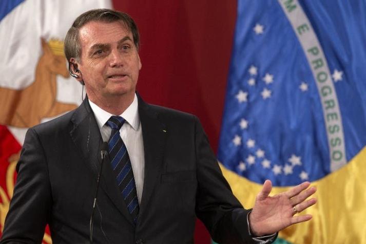 Bolsonaro dice que Brasil "no debe nada" al medio ambiente en despedida de Chile