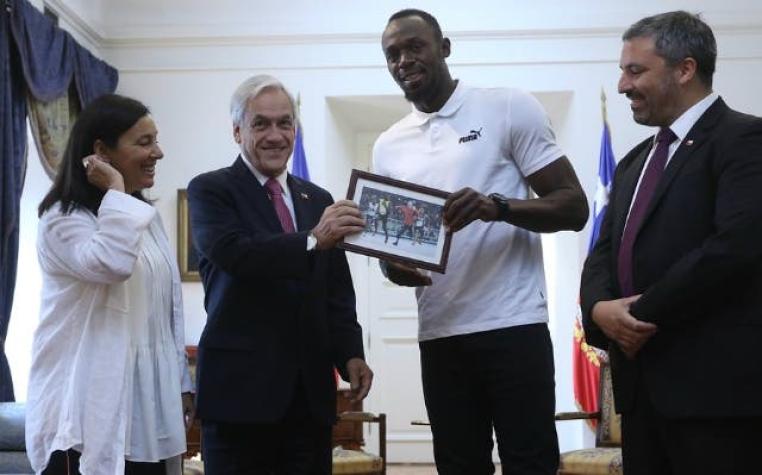 [VIDEO] Presidente Piñera sorprende a Usain Bolt y le muestra un "meme" de ambos