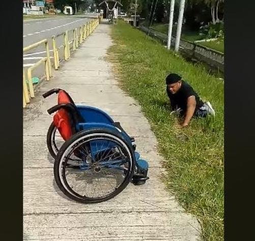 [VIDEO] Hombre dejó su silla de ruedas para rescatar a un gato y conmovió en redes sociales