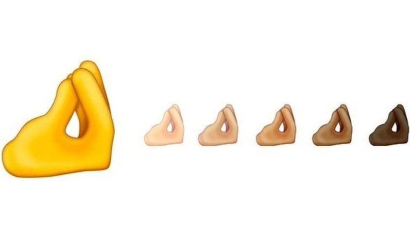 Los múltiples significados en el mundo del nuevo emoji de los "dedos pellizcados"