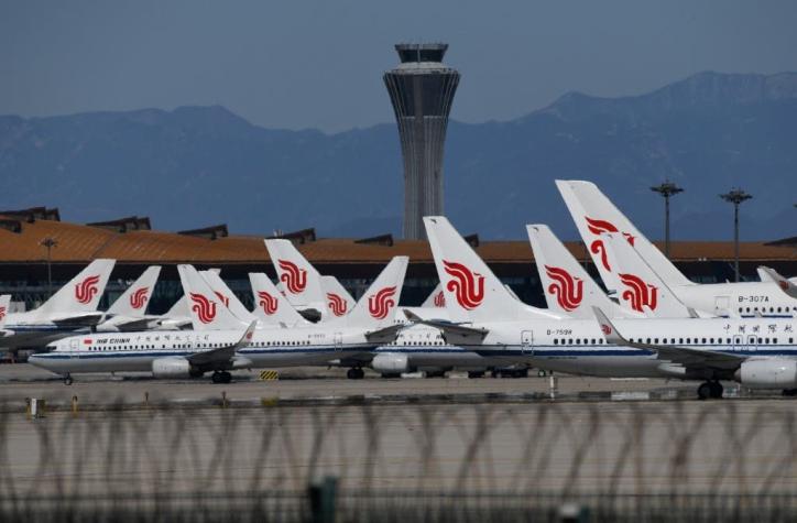 Aeropuertos de Pekín cancelan más de un millar de vuelos por coronavirus