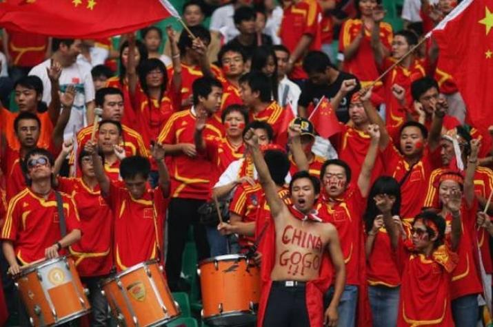 El fútbol volvió a China con un minuto de silencio