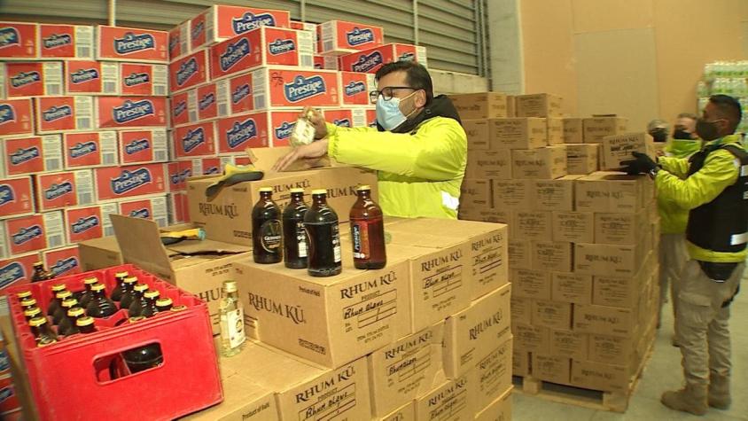 [VIDEO] 20 mil botellas de ron acopiadas irregularmente en Renca: Bodega funcionaba sin permisos