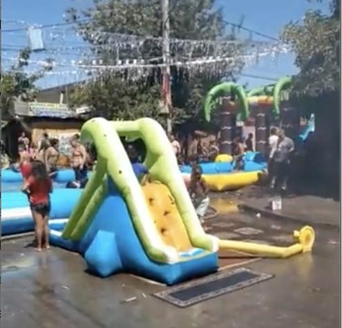 Municipalidad de La Pintana se querella contra organizador de "fiesta del agua" durante cuarentena