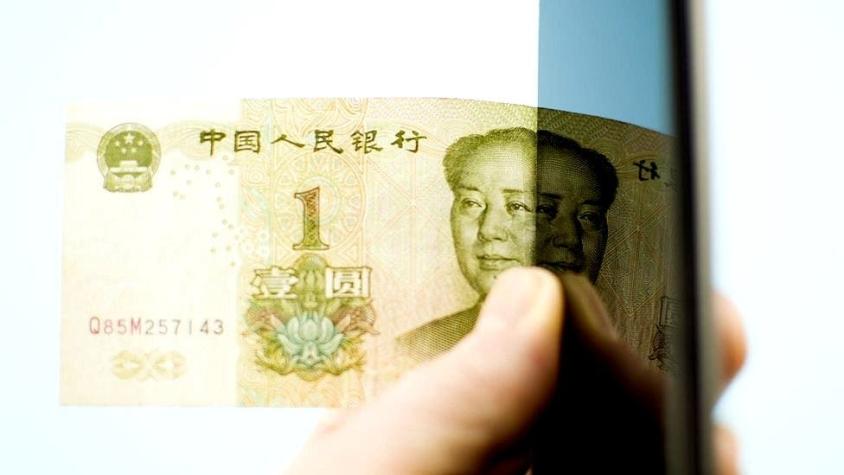 Por qué el "yuan digital" chino puede ser una amenaza para el dólar y para las criptomonedas