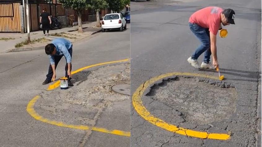 [VIDEO] El tiktoker viral por enmarcar en amarillo los hoyos de las calles de Santiago