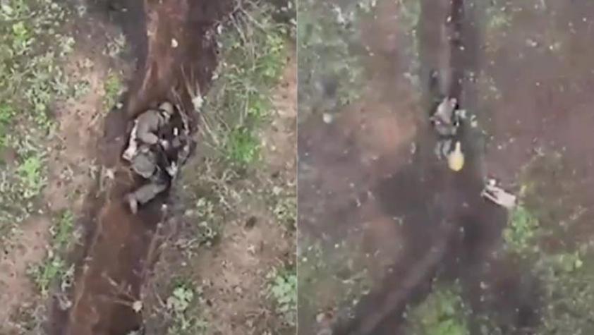 [VIDEO] Registro muestra a soldado ruso detener y arrojar dos bombas que le lanzó un dron