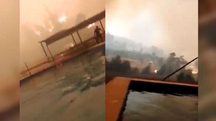 [VIDEO] Mujer y su hija se refugiaron en una piscina mientras el fuego avanzaba en Santa Juana