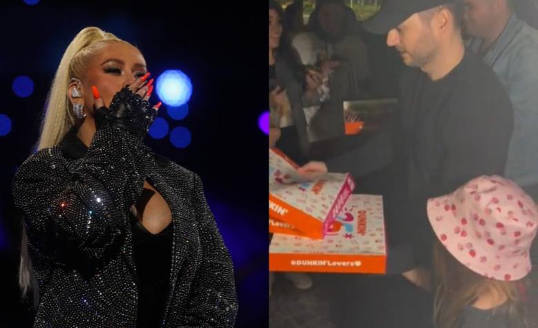 Pareja e hija de Christina Aguilera regalaron donas a los fans que estaban esperándola en el hotel