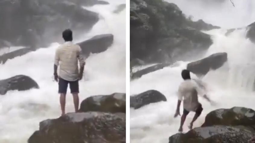 Joven resbala de una roca al intentar fotografiar una cascada
