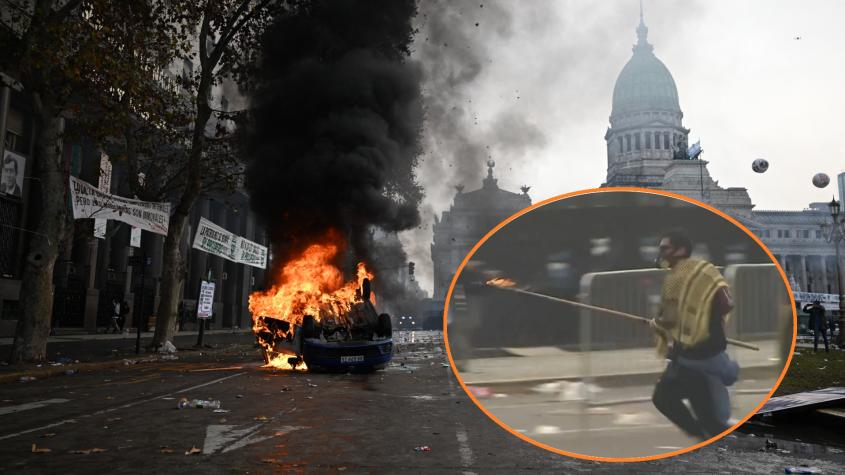 Captan a sujeto lanzando jabalina con fuego durante disturbios frente al Congreso en Argentina