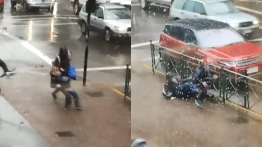 VIDEO muestra fuerte caída de madre y su hijo producto del intenso viento en Temuco