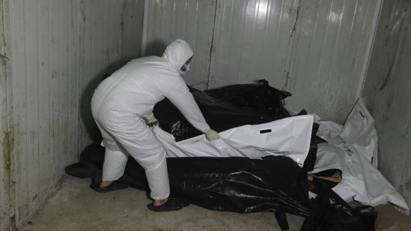 Rebeldes sirios hallan decenas de cuerpos con señales de tortura en hospital cerca de Damasco Rebeldes sirios hallan decenas de cuerpos con señales de tortura en hospital cerca de Damasco
