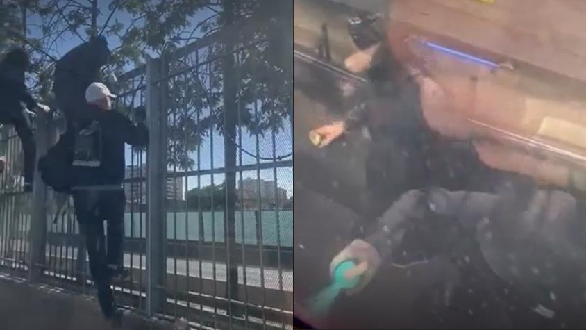 VIDEO | Encapuchados paran y grafitean vagón de la Línea 2 del Metro: escaparon por la carretera