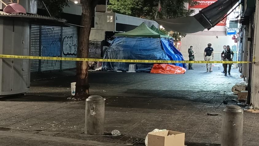 Homicidio en pleno Santiago Centro: hombre es hallado muerto con un disparo en la cabeza